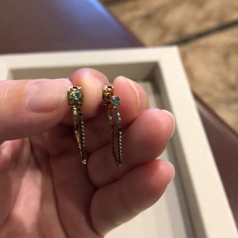 Dainty emerald chain earrings.
